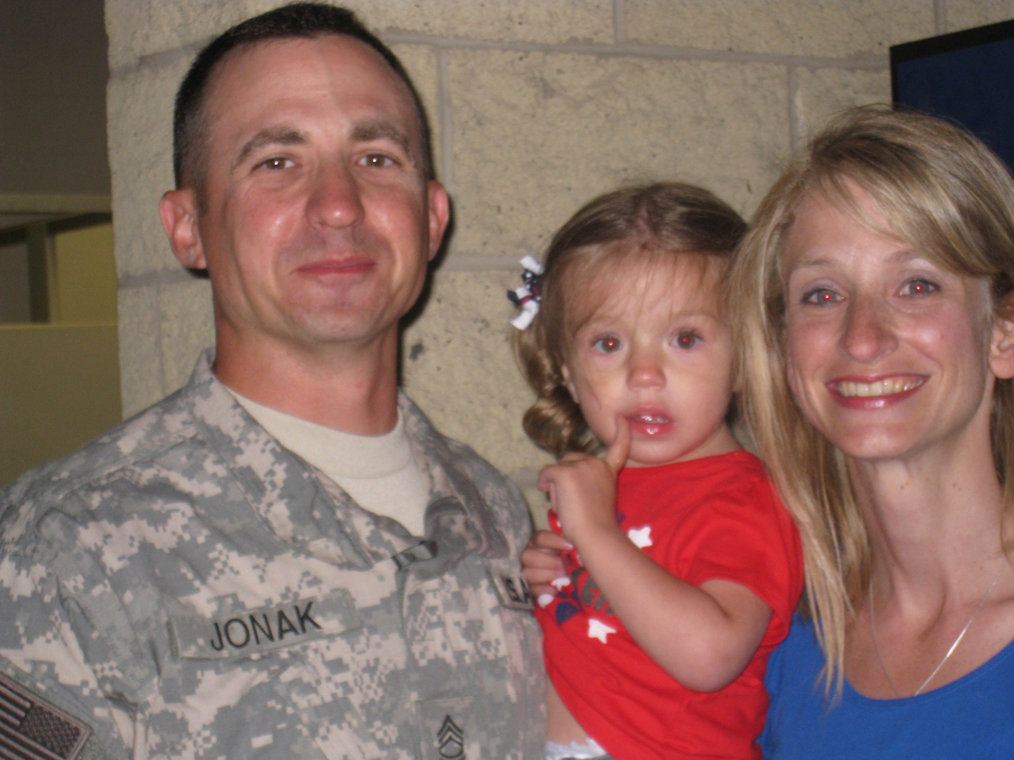 John Jonak in uniform with family